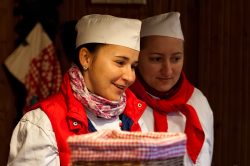 Christkindelmarkt, Leeds is one of the most established German Christmas Markets in the UK, with traditional wooden stalls, festive greenery, Christmas carousel rides and twinkling colourful lights all creating a unique continental style festive atmosphere in the heart of Leeds city centre.

Set in the stylish civic setting of the award winning Millennium Square, Christkindelmarkt attracts many hundred thousands of visitors to Leeds each year and forms an integral part of the city’s annual events programme.

The market consists of over 40 wooden chalet stalls from authentic German traders providing a wide range of seasonal gift ideas for everyone including; handcrafted toys, jewellery, Christmas cards and festive decorations, speciality foods and traditional German delicacies such as gluhwein, bratwurst sausages, goulash, soups, schnitzels, stollen, gingerbread and candied fruits.

To enhance the overall visitor experience of the event an adjoining festive funfair provides fun for all the family including a traditional Christmas Carousel and a selection of children's rides and attractions.

The popular Frankfurter-Scheune Festive Meeting Hall and eatery provides specialist food menu including traditional roasts and regular evening musical entertainment.